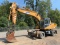 1999 SAMSUNG SE170W-3 RUBBER TIRE EXCAVATOR