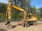 1993 JOHN DEERE 595D RUBBER TIRE EXCAVATOR