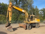 1993 JOHN DEERE 595D RUBBER TIRE EXCAVATOR