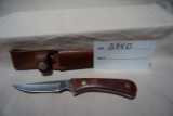 Fixed Blade Western with Leather Sheath.