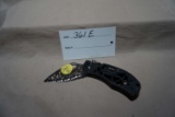 Spyderco Folding Knife with Patterned Blade and Handle.