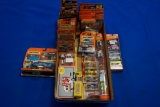 Large Box of Matchbox: 40- w/5-Premiers, 5-Hvy. Rigs, 3-5 packs, 1-911 Book, 18-singles, 1-Real Talk