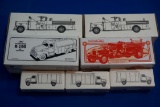 Box of 7-Ertl Banks w/2-1955 Ward LaFrance Fire Trucks, 1-1929 Mack, 1957 Int. R-150 & 3-Beverage Tr