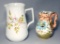 Two Decorative Porcelain Pitchers