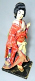 Asian Woman Doll on Wooden Base