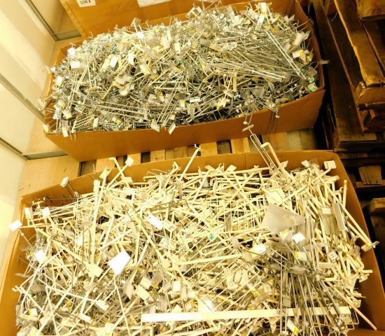 Two Large Containers of Gondola Shelving Pegboard Hooks and Accessories