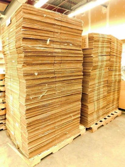 Two Large Stacks of Flattened Cardboard Boxes, 650+ Units