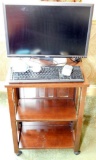 Wooden Table with Bookshelves and DELL Monitor, Keyboard and Speakers