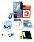 Assorted Computer Parts and Supplies, Including Laptop Skin and Earphones