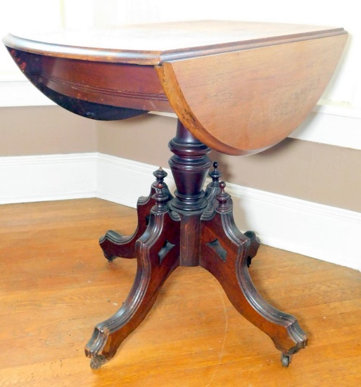 Antique Round Double Drop-leaf Pedestal Table on Casters