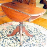 Double Drop-leaf Round Pedestal Table
