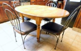 Wooden Dining Table with Four Black Metal Chairs