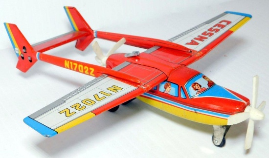 ALPS Cessna Skymaster Airplane Tin Friction Toy