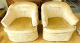 Pair of Yellow/Gold Upholstered Swivel Chairs