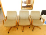 Three (3) Upholstered Swivel Office Armchairs