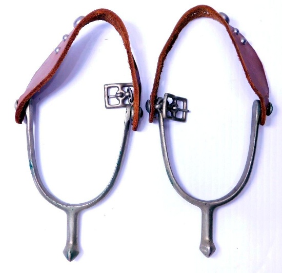 Pair of Spurs and Toy Percussion Pistol