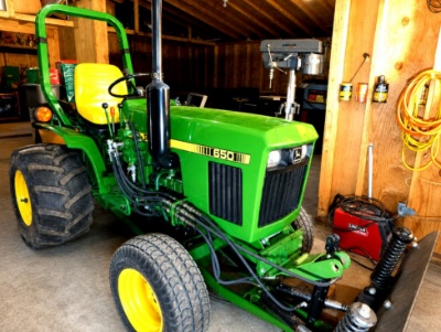 John Deere 650 Tractor w/ Front Blade