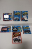 7 - 1/43rd scale trucks & cars - Road Champ - bubble packs