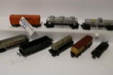 8 rail cars - 2 Lionel tankers - 1679 Baby Ruth - 1680 tanker - 6454 box ca