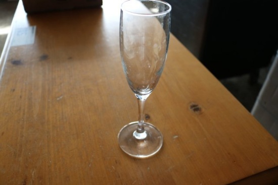 Fluted champagne glasses w/ dishwasher boxes