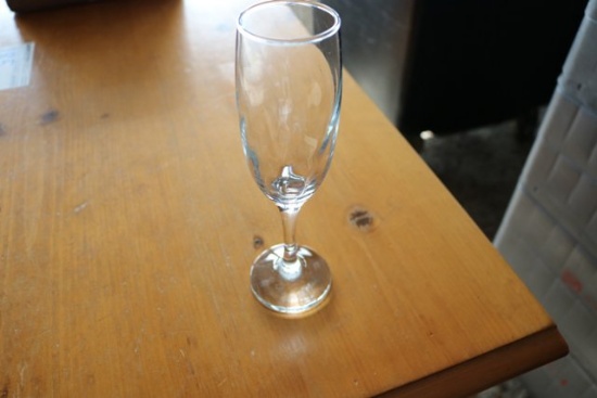 Fluted champagne glasses w/ dishwasher boxes