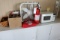 Microwave, fire extinguisher, fan, first aid kit
