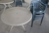 White plastic patio table w/ 5 blue plastic chairs
