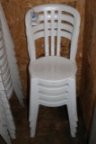 White plastic patio chairs