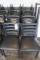 Black metal frame ladder back dining chairs w/ black vinyl seats