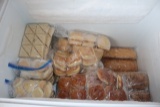 Assorted frozen bread & buns in freezer - freezer not for sale