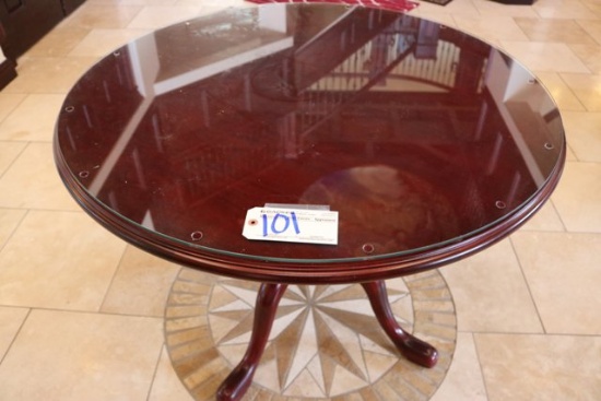 42" round cherry finish table with glass top