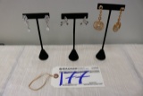 3 sets of earrings with stands