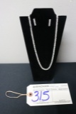 Necklace and earings with display