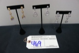 3 sets of earings with stands