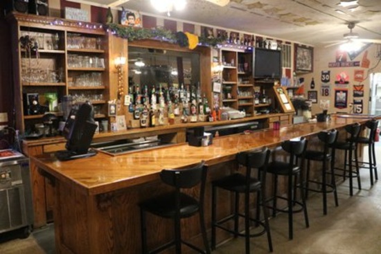 19’ Oak back bar, 70” smoked glass mirrored back bar, canopy