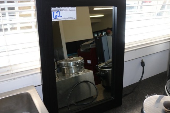 Black framed wall mirror
