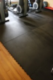 4’ x 4’ x ½” thick interlocking rubber floor mats - under elliptical and tr