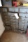 Multi bin cabinet with inventory _mainly drill bits)