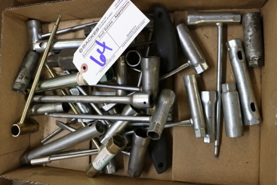Flat of chainsaw wrenches & tools