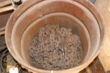 Under 1/2 full barrel of steel chain