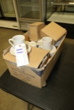 Case of coffee mugs and saucers