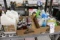Shelf with concrete sealer, acetone, spray bottles, polyurethane kits