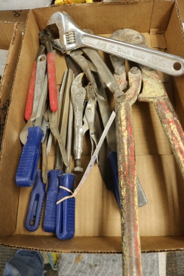 Box of vice grips, hand files, crescent wrenches and bolt cutters