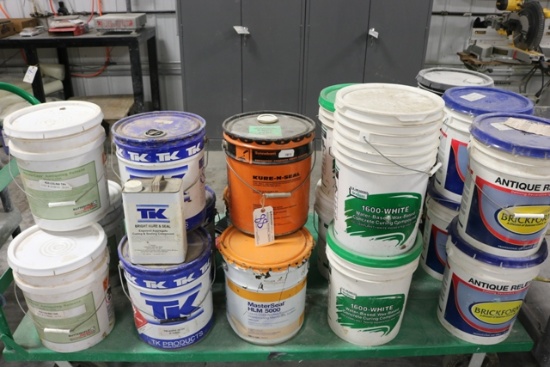 Assorted open product of cure and seal, tri coat, wax base, brick form and