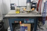 Bosch router with counter top router table