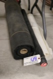 Roll of visqueen and heavy duty weed barrier