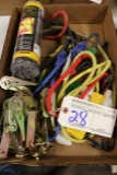 Box of bungee straps, foam ear plugs and ratchets