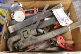 Box of flat bars, pipe wrench, scrapper and C clamp