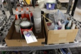 Shelf of Spray paints and glue