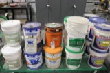 Assorted open product of cure and seal, tri coat, wax base, brick form and